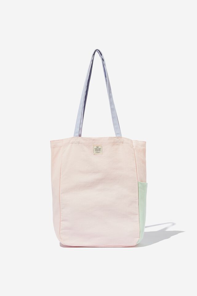 A blush pink tote bag