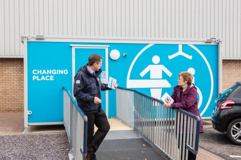 Picture of Liam Smith with Sarah Boyack at the Changing Places facility