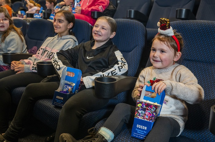 Children sitting in a cinema